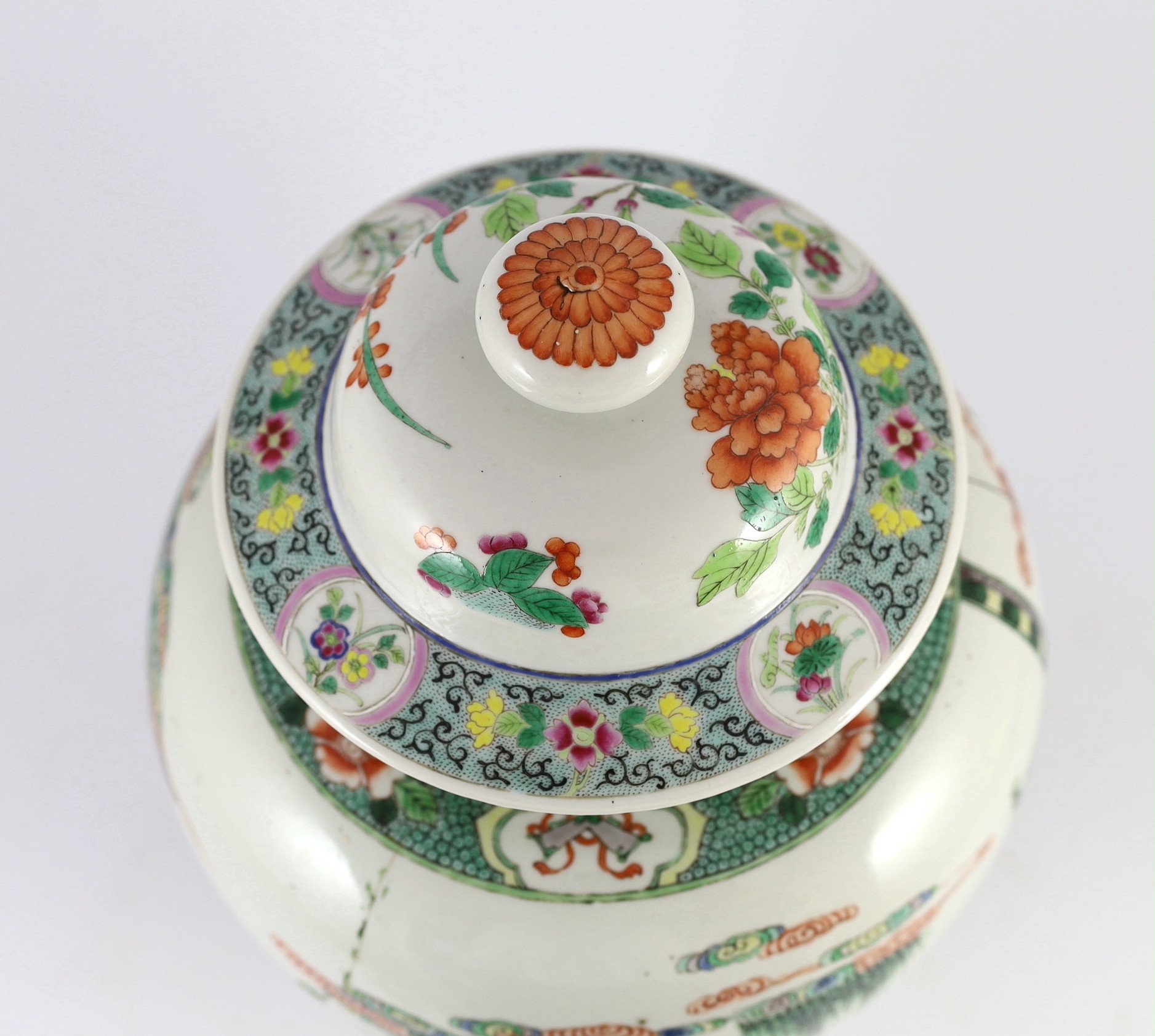 A Chinese famille verte jar and associated cover, 19th century, 41cm high, damaged and matched cover